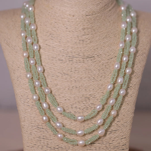 Zelena- A serene blend of prehnite’s tranquil green and the soft glow of rose pink pearls—where nature’s grace meets timeless elegance