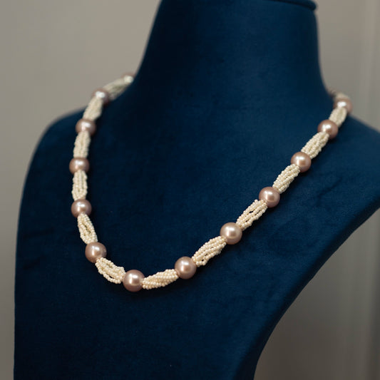 Adiya- combination  of interwined off white colour pearls with rose gold round pearl necklace