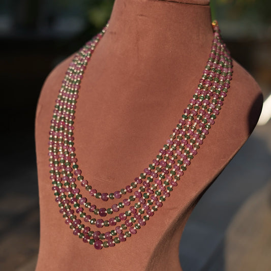 Iridia-A mix of Natural Rubies and Emeralds strung together with a tinge of Pearl to form a mesmerising necklace