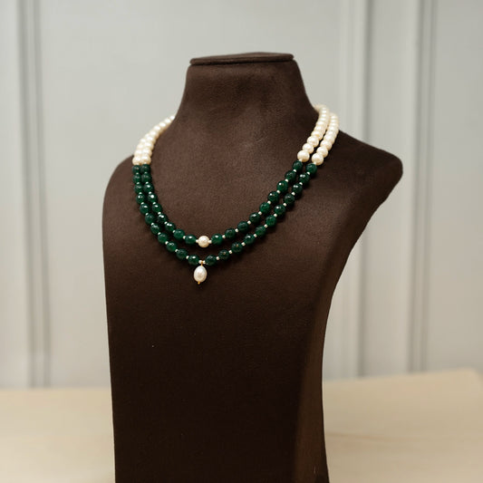 Khidr- Cultured Pearls with a blend of Onyx and drop shape pearl in the centre