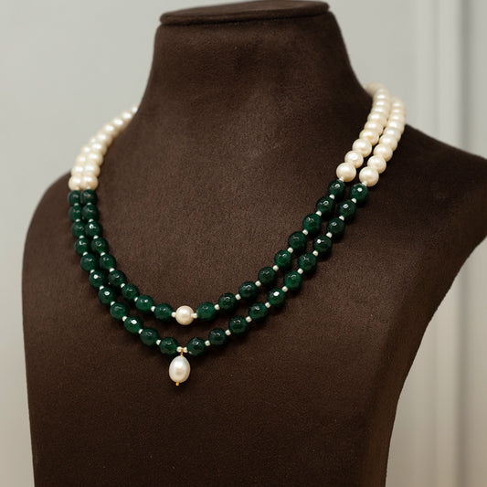 Khidr- Cultured Pearls with a blend of Onyx and drop shape pearl in the centre