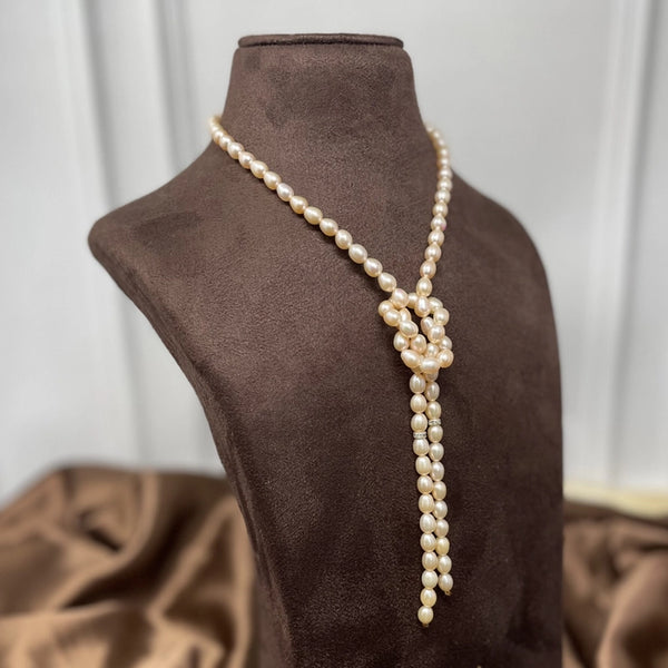Mohati- Freshwater Pearl necklace forming a knot from 2 different strands of pearls